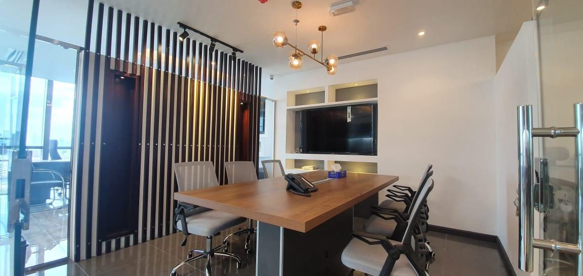 Completed office floor with glazed offices and open desking