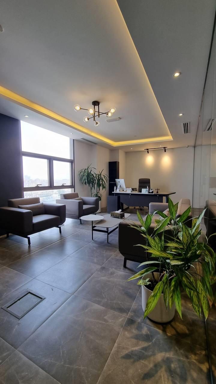 Waiting area with lounge seating and planting