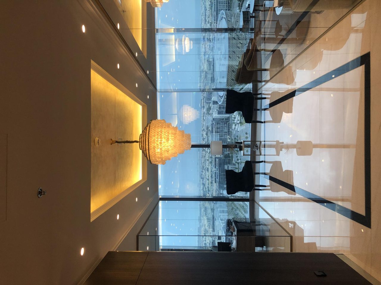 Feature corridor with concealed cove lighting in warm tones
