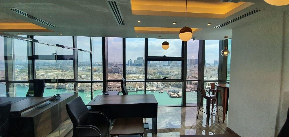 Refurbished office floor with glazed partitions and waterfront views